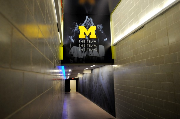 Players run down this tunnel, which connects Crisler Arena to the Player Development Center, to get to the court. Melanie Maxwell I AnnArbor.com